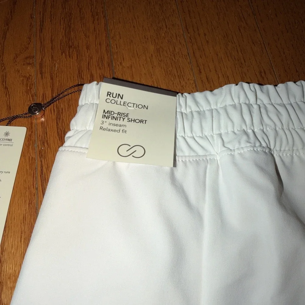 CALIA‎ Infinity Run Golf Tennis Shorts Large White Mid Rise Zipper Pocket Lined